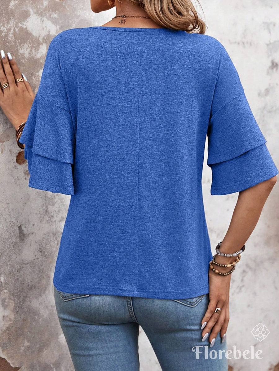 BLUSA CON MANGAS DE VOLANTES