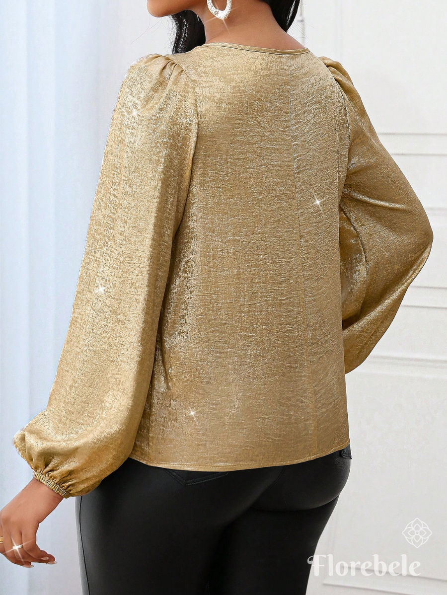 BLUSA CON MANGAS FAROL DORADA