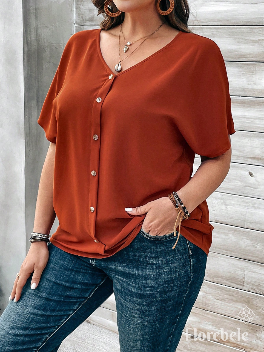 CAMISA CON ESCOTE EN V Y BOTONES