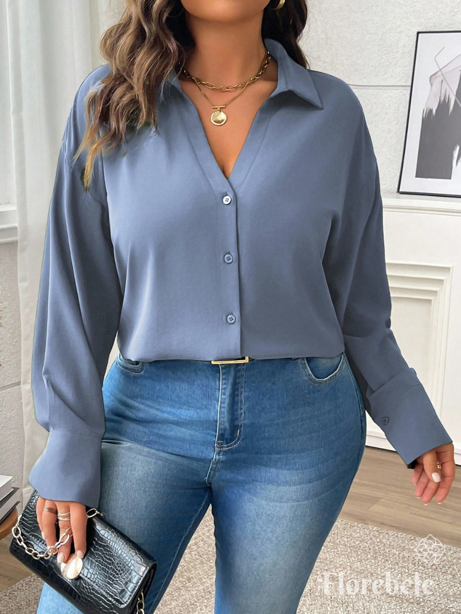 CAMISA UNICOLOR CON ESCOTE EN V