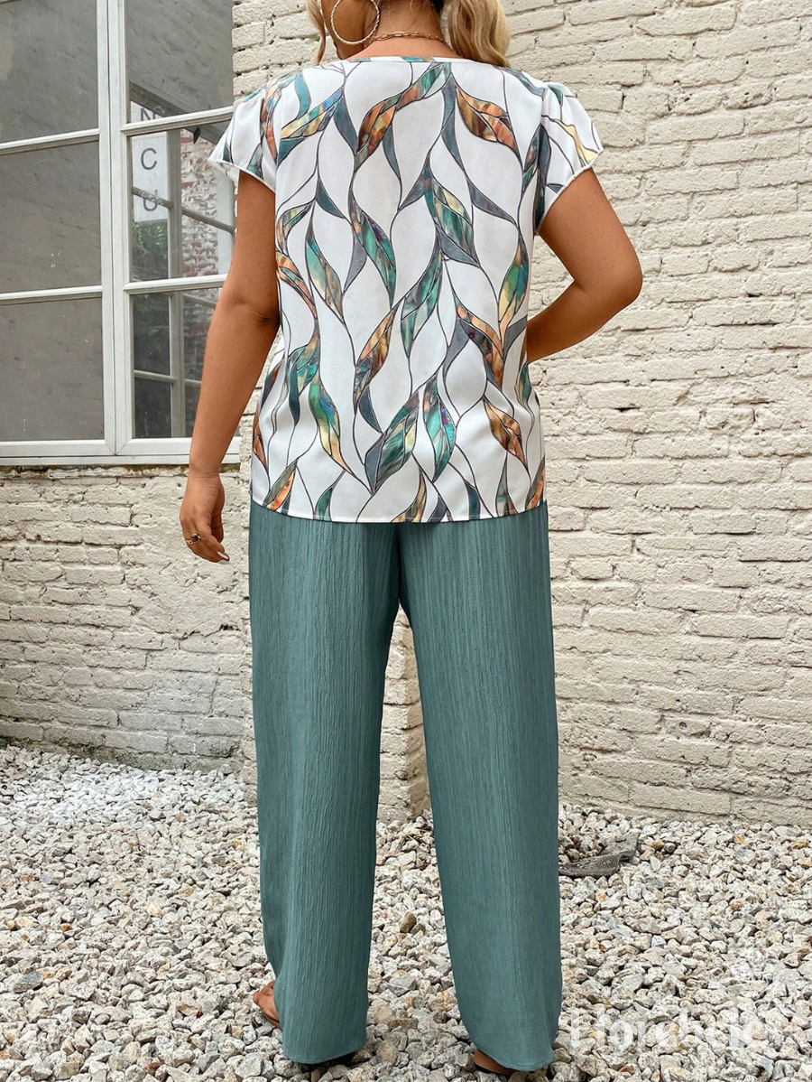 CONJUNTO CON BLUSA ESTAMPADA Y LAZO