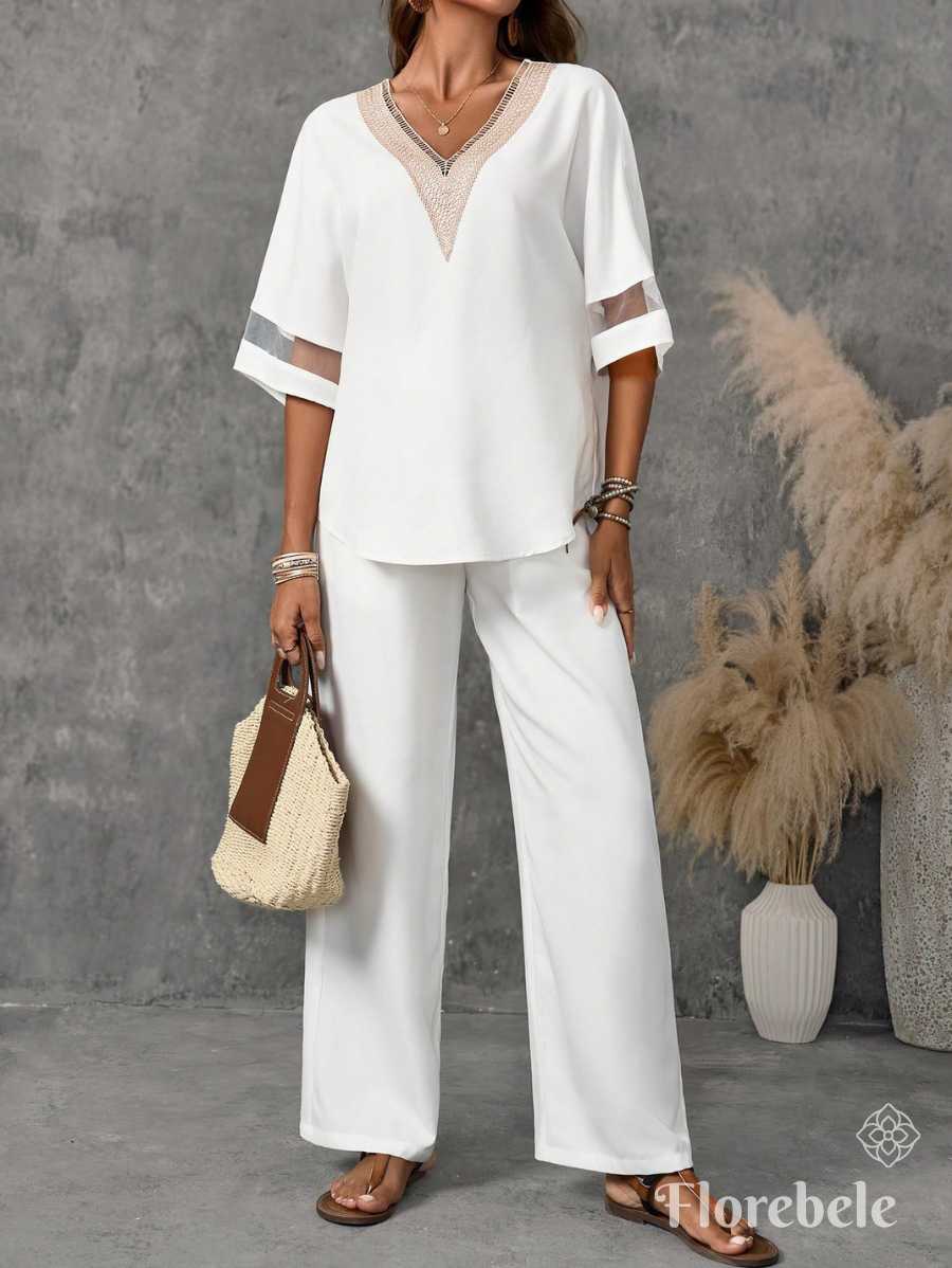 CONJUNTO CON ESCOTE EN V Y TRANSPARENCIA