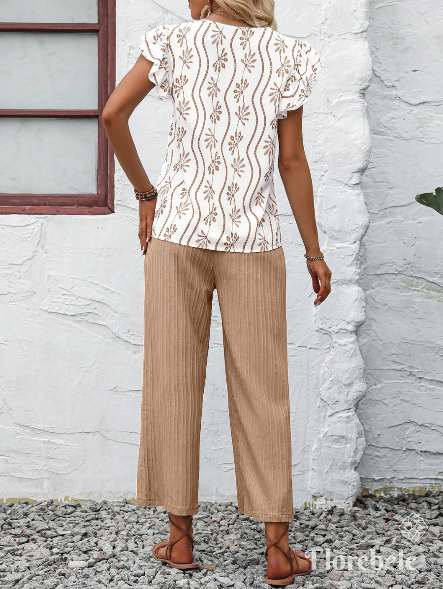 CONJUNTO CON LAZO Y BLUSA ESTAMPADA