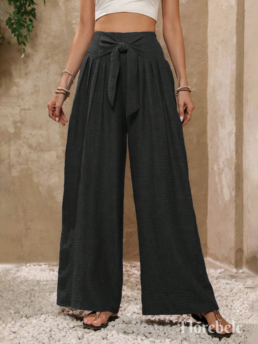 PANTALÓN CON LAZO DE PIERNA ANCHA