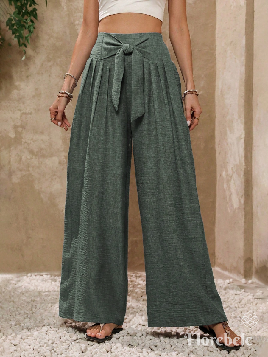 PANTALÓN CON LAZO DE PIERNA ANCHA