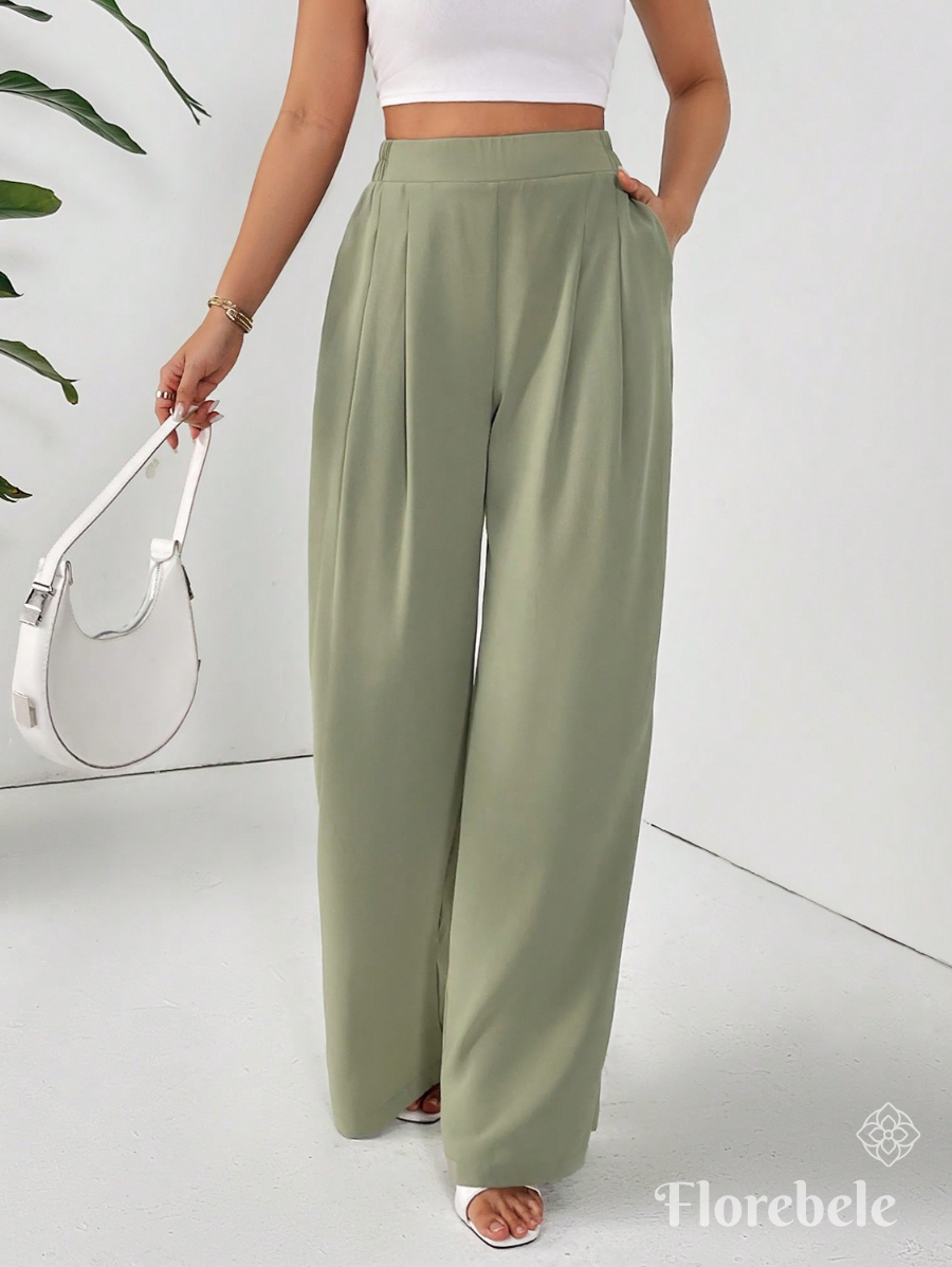 PANTALÓN UNICOLOR CON PLIEGUES