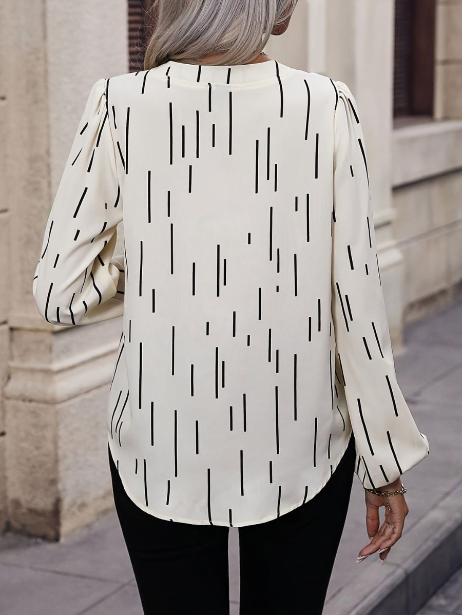 BLUSA CON ESCOTE EN V A RAYAS Blusa 37 Florebele