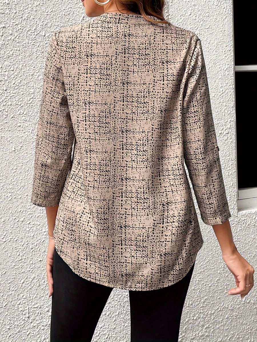 BLUSA ESTAMPADA CON ESCOTE EN V Blusa 35 Florebele