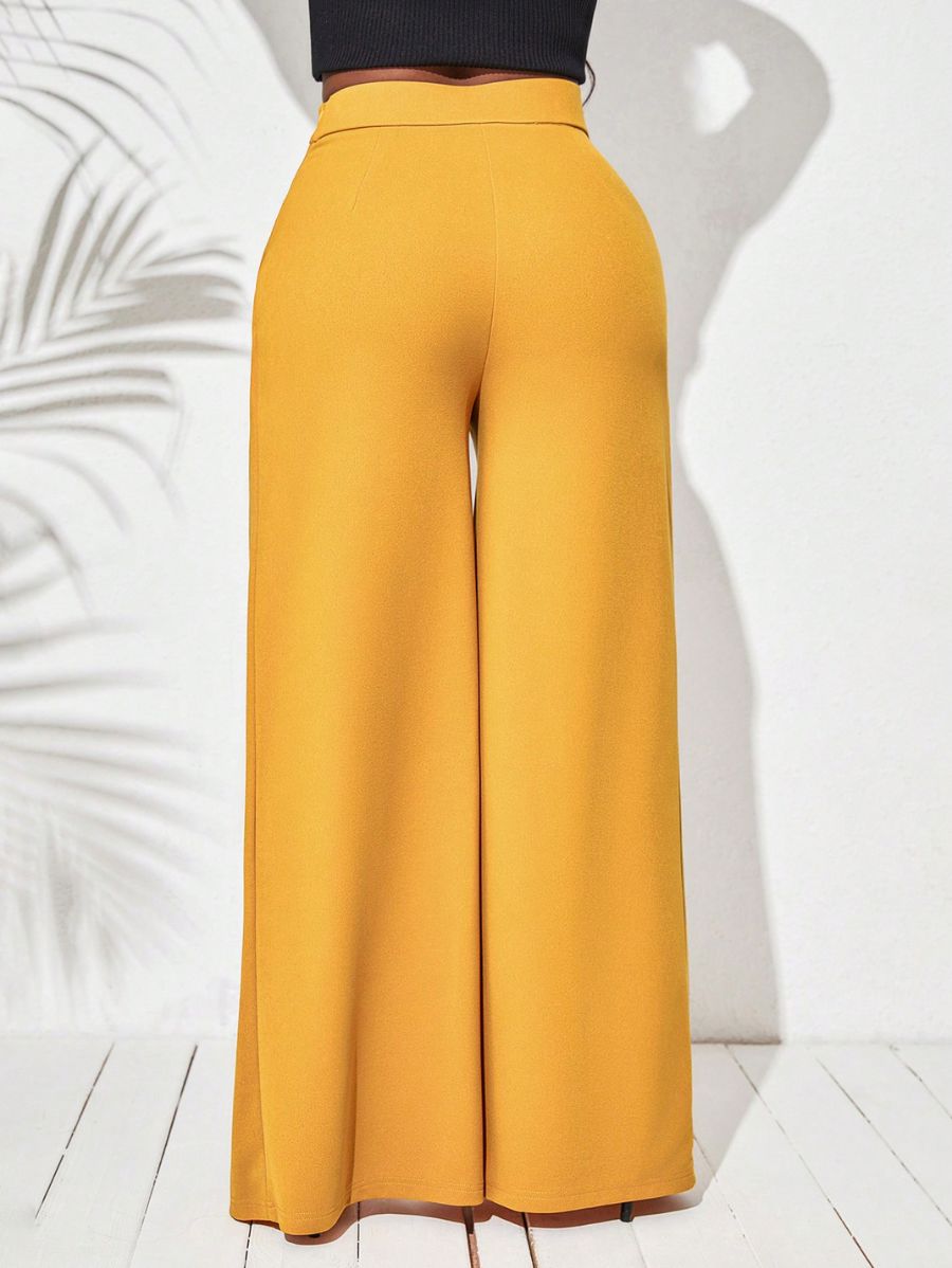 PANTALÓN CON BOTONES Y HEBILLA Pantalón 11 Florebele