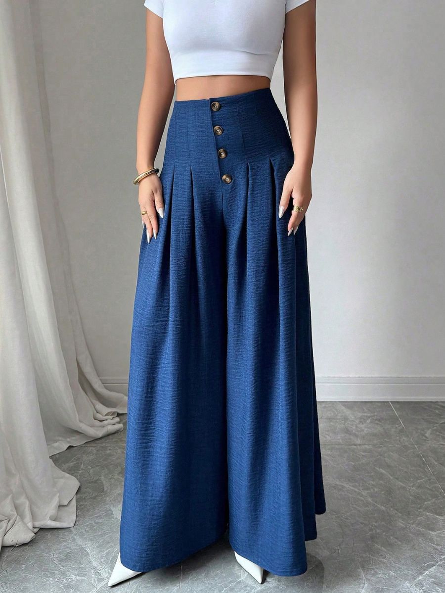 PANTALÓN CON PLIEGUES Y BOTONES Pantalón 10 Florebele