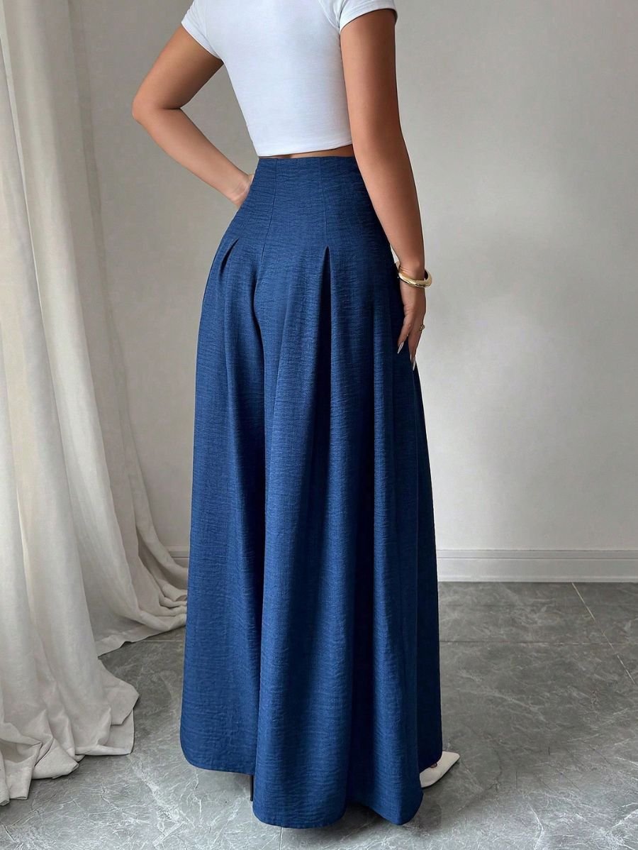 PANTALÓN CON PLIEGUES Y BOTONES Pantalón 10 Florebele