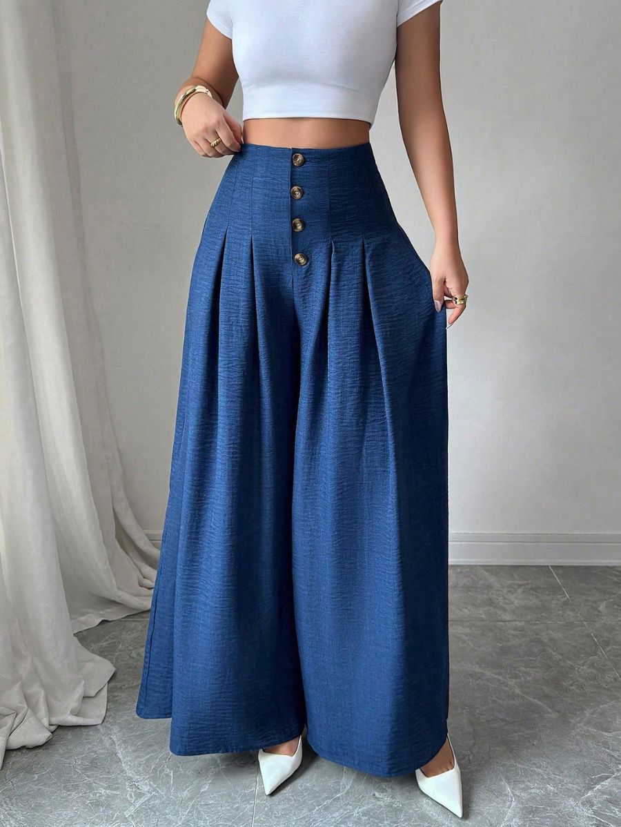 PANTALÓN CON PLIEGUES Y BOTONES Pantalón 10 Florebele