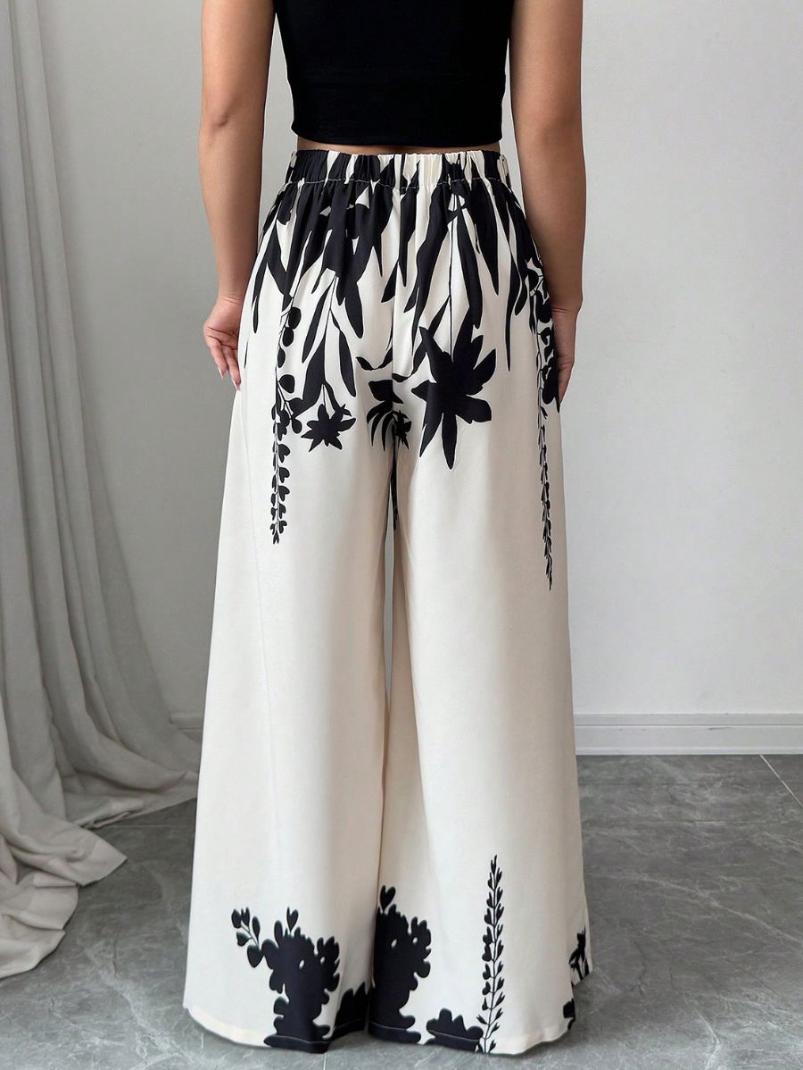 PANTALÓN DE PIERNA ANCHA CON ESTAMPADO FLORAL Pantalón 09 Florebele