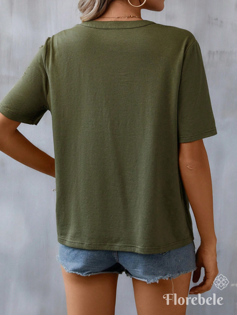 BLUSA CON BORDADO Y CUELLO DE MUESCA