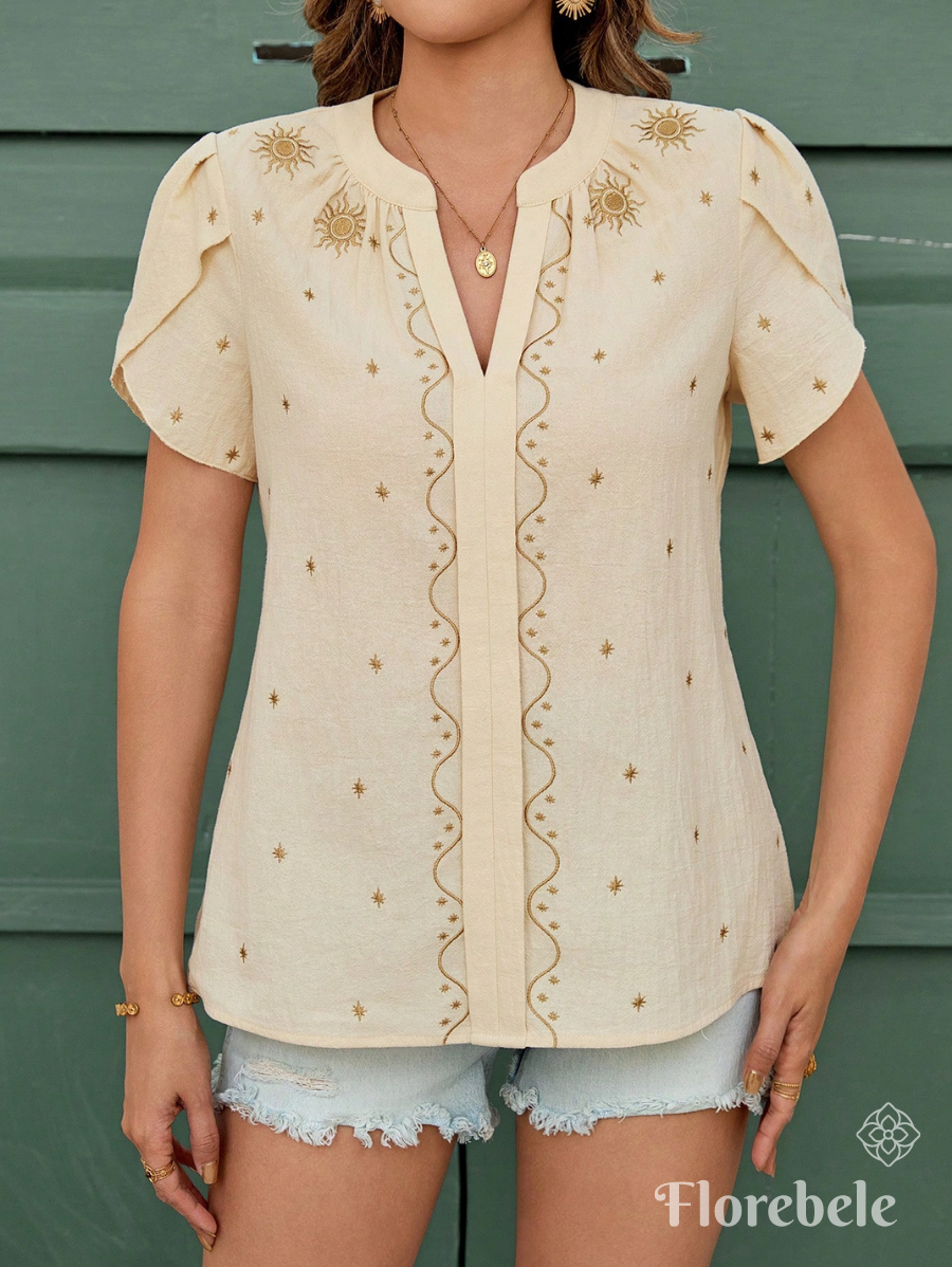 BLUSA CON BORDADO Y ESCOTE EN V