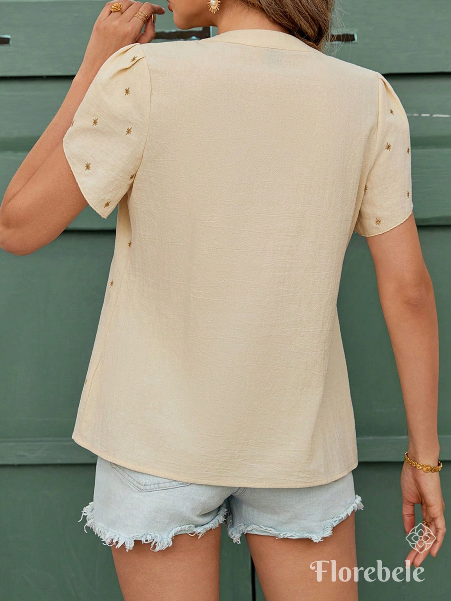 BLUSA CON BORDADO Y ESCOTE EN V