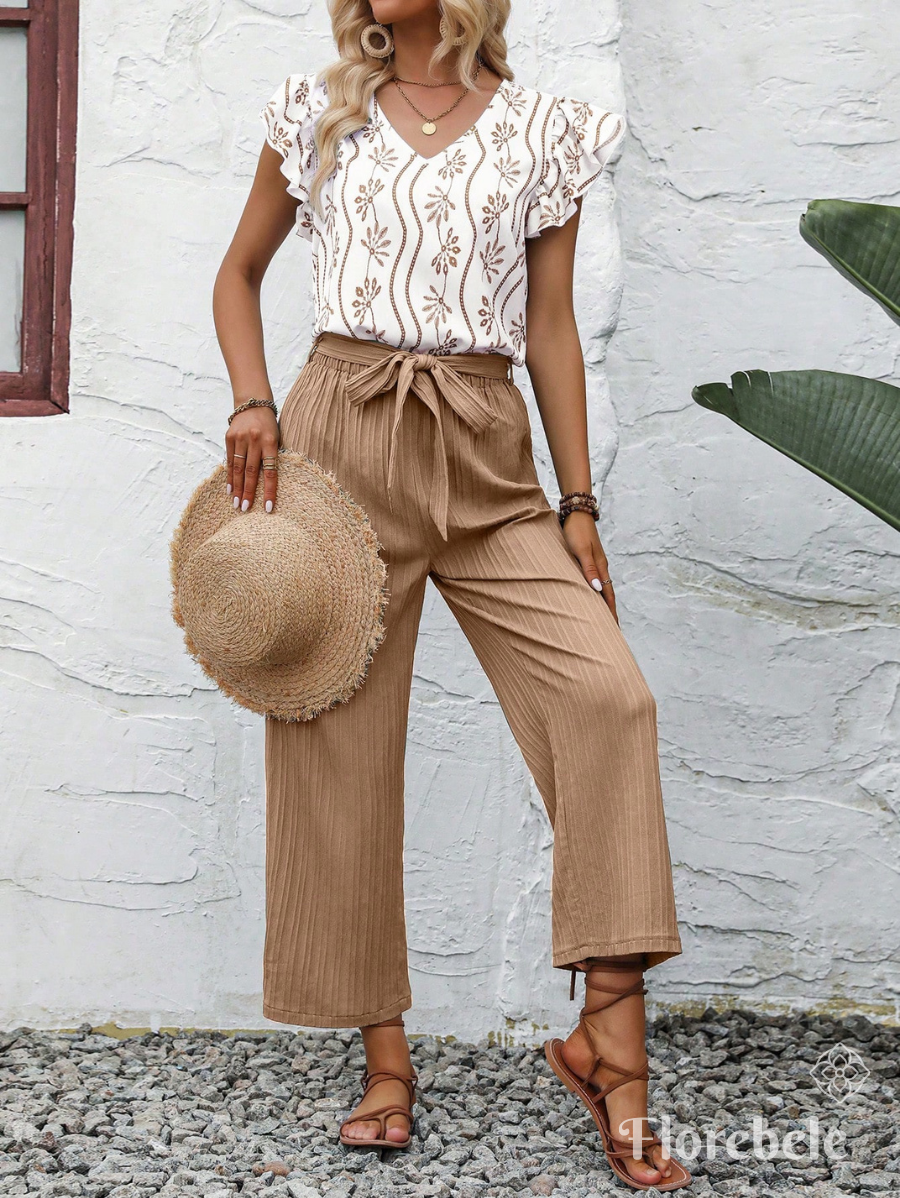 CONJUNTO CON LAZO Y BLUSA ESTAMPADA