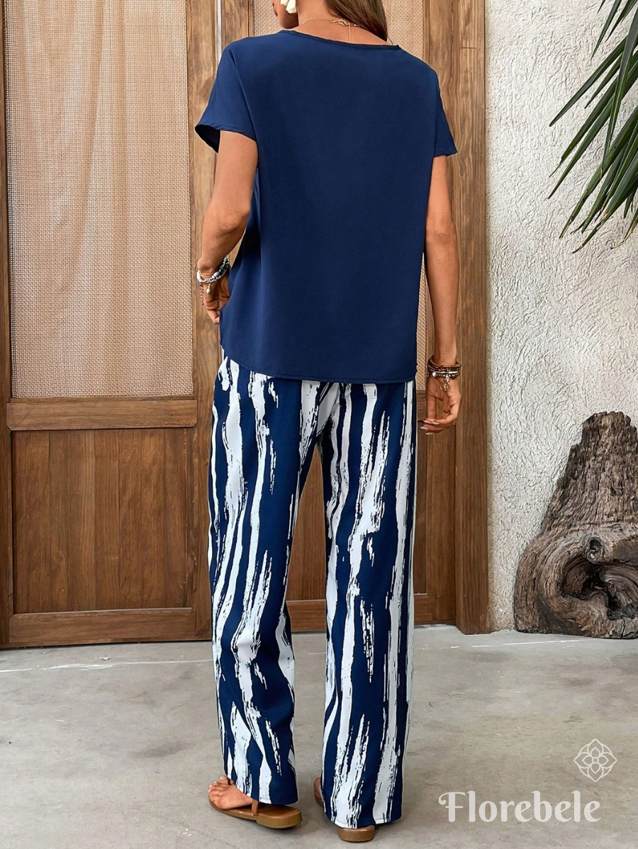CONJUNTO CON PANTALÓN A RAYAS