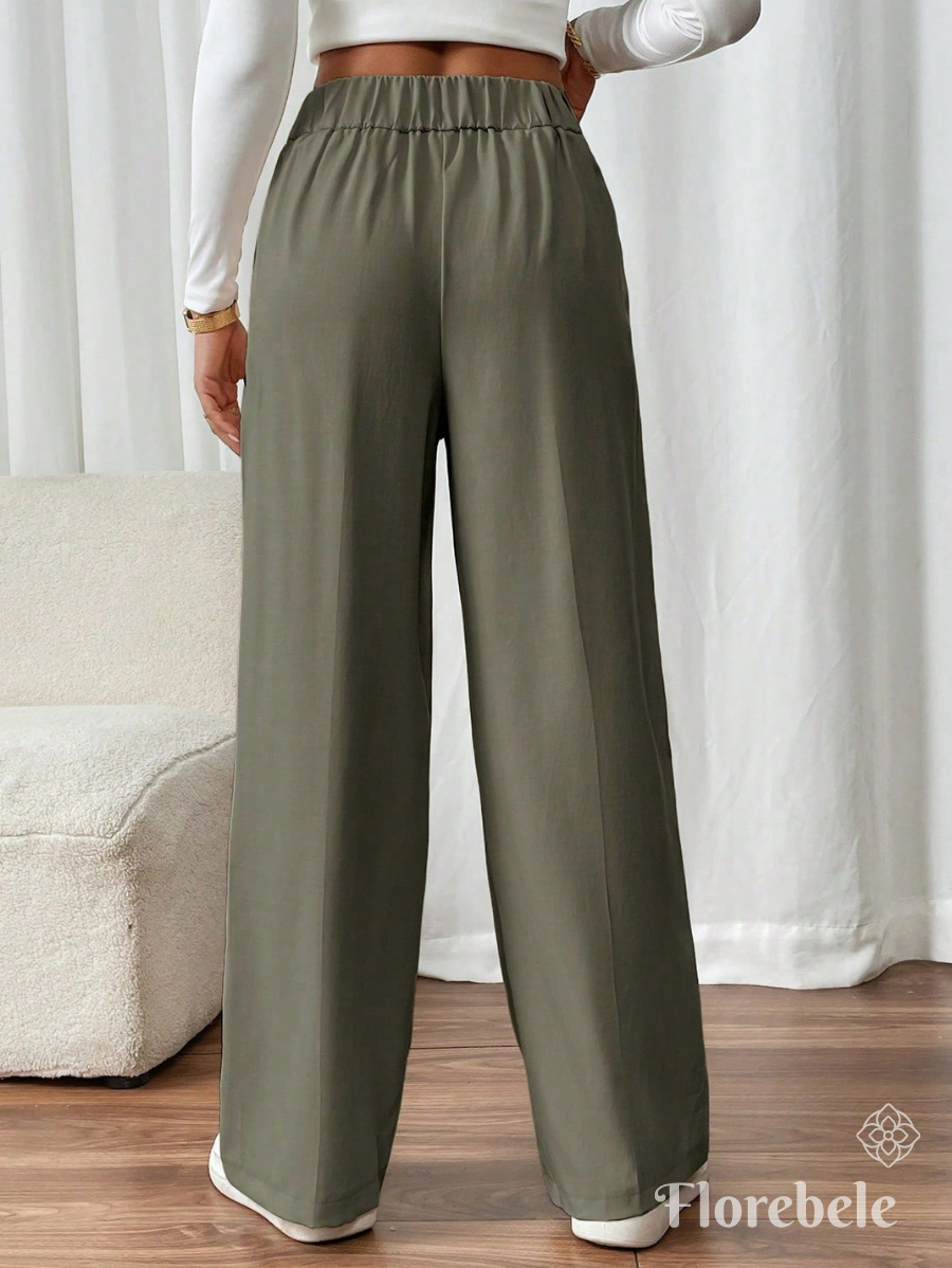 PANTALÓN CON BOTONES DORADOS