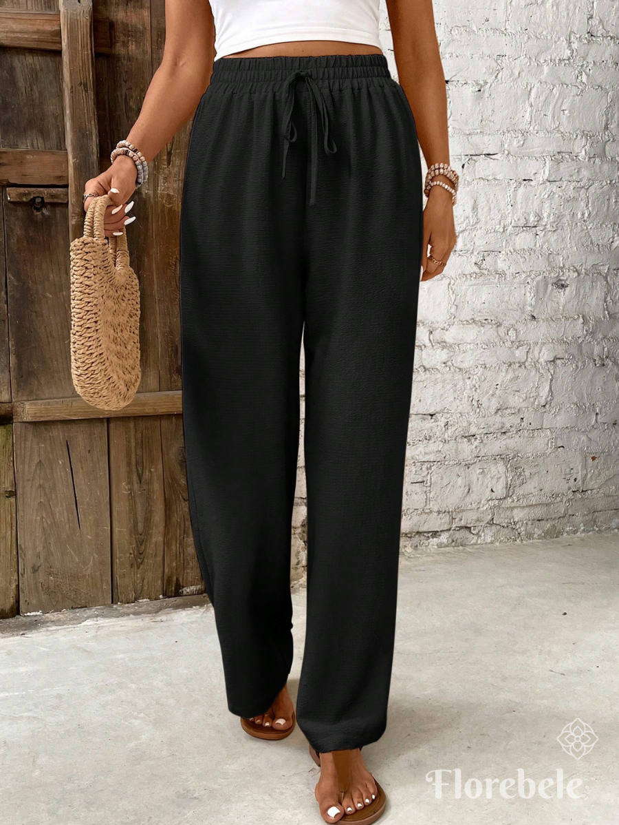 PANTALÓN UNICOLOR CON CINTURA ELÁSTICA