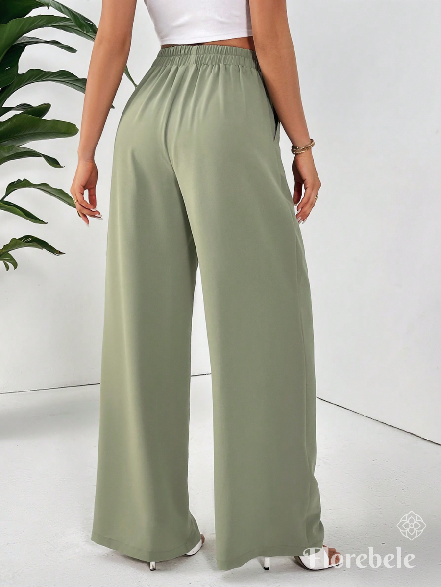 PANTALÓN UNICOLOR CON PLIEGUES