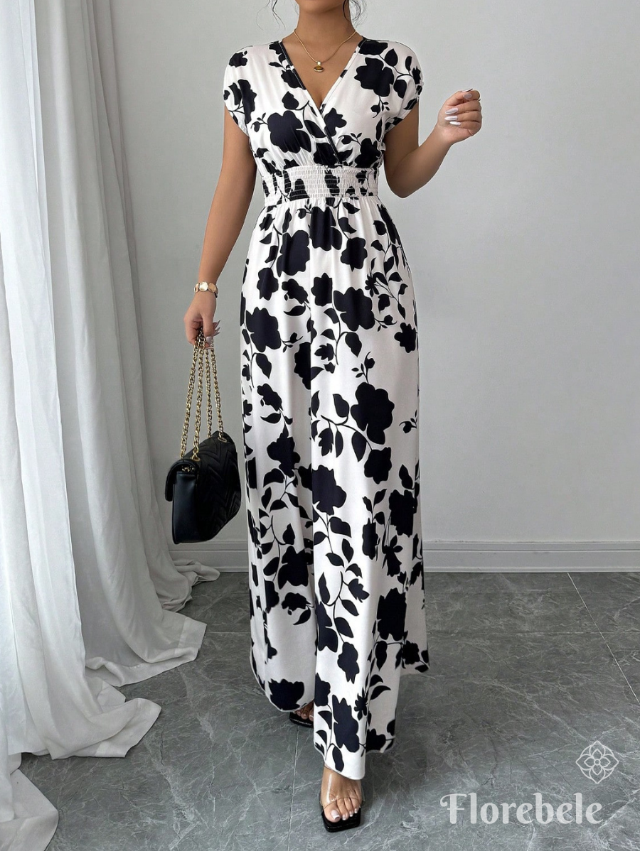 VESTIDO CON ESTAMPADO FLORAL Y CINTURA ELÁSTICA