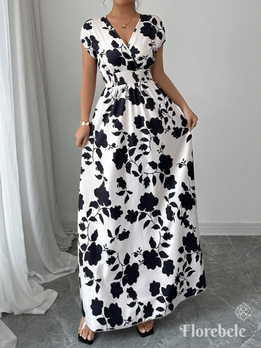 VESTIDO CON ESTAMPADO FLORAL Y CINTURA ELÁSTICA