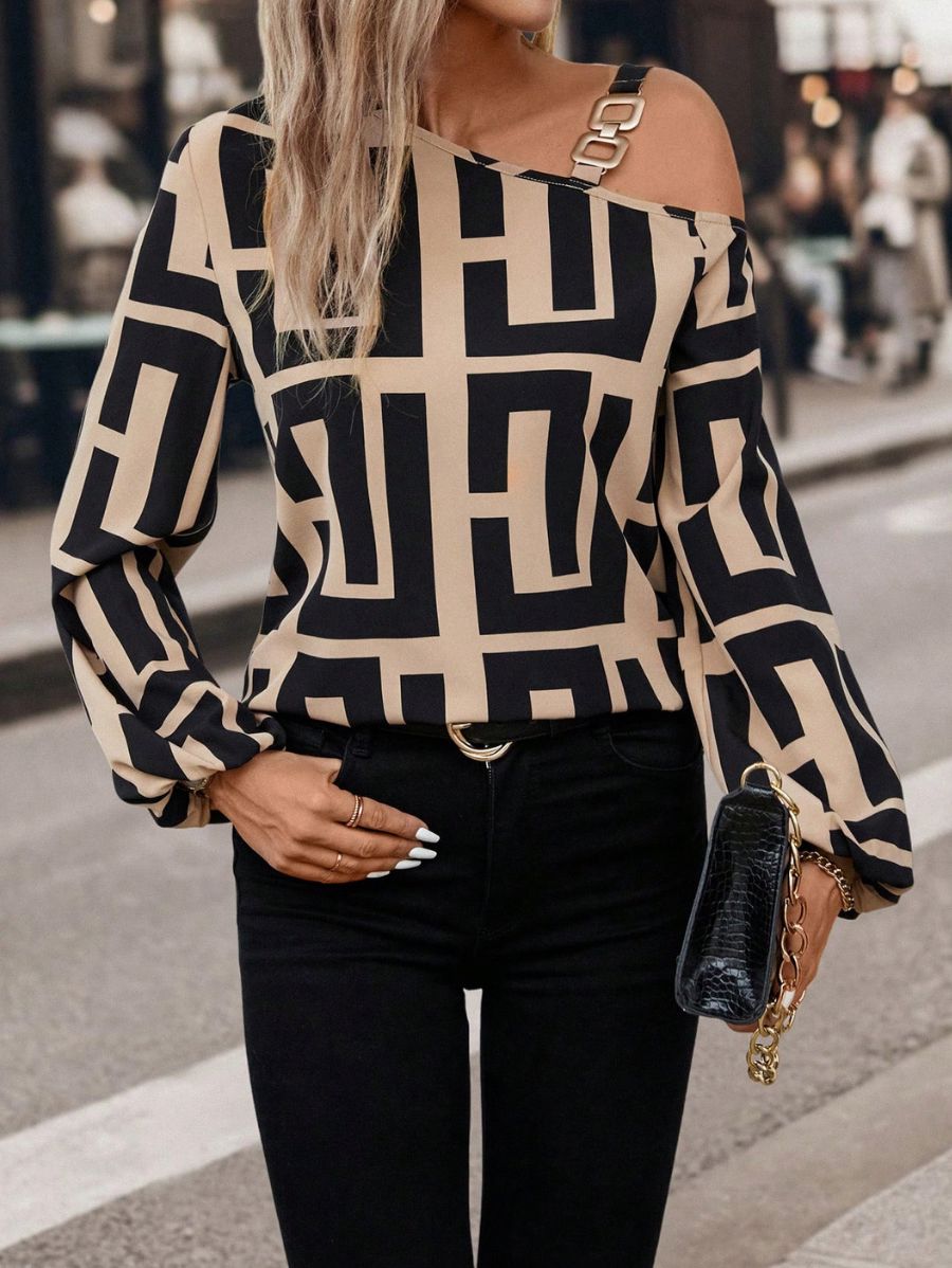 BLUSA CON ESTAMPADO GEOMÉTRICO Y DETALLE DORADO Blusa 40 Florebele S 